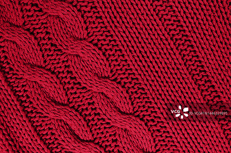 2023年流行色针织纹理。品红色线纹理。图片素材