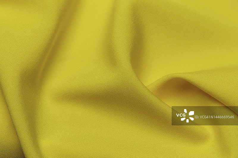 黄色涤纶纺织品背景图片素材