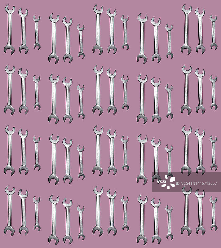 扳手平铺行列图案（粉色背景）图片素材