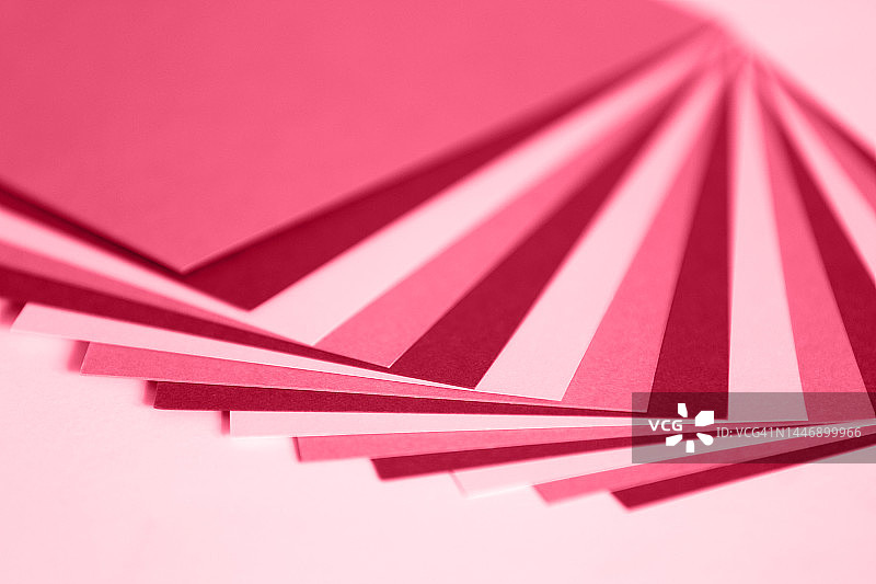 抽象粉色、品红色和珊瑚色几何背景图片素材