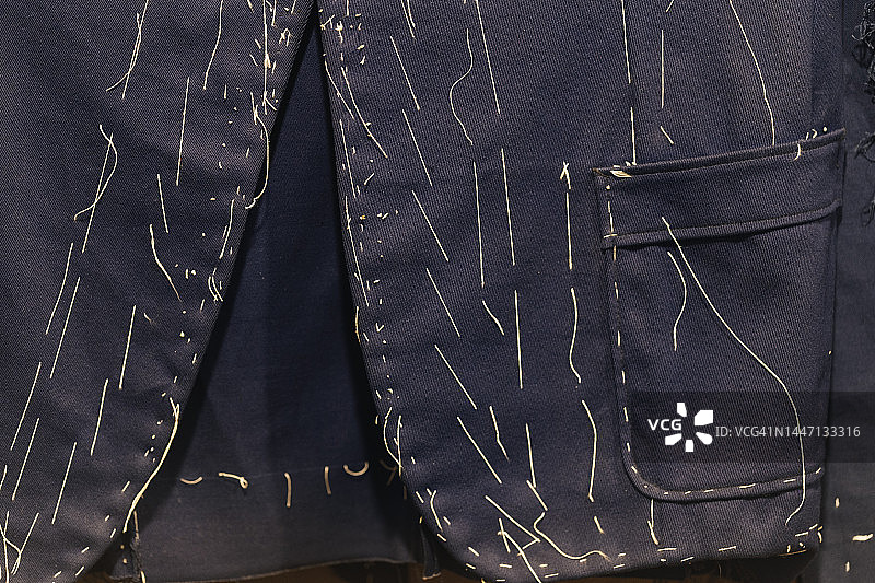 老式美式西装外套手工缝纫细节特写图片素材