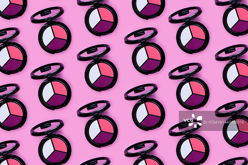 粉色背景上的鲜艳眼影图案图片素材