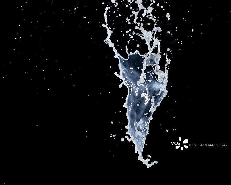 白色丙烯颜料在黑色背景上的水滴和飞溅图片素材