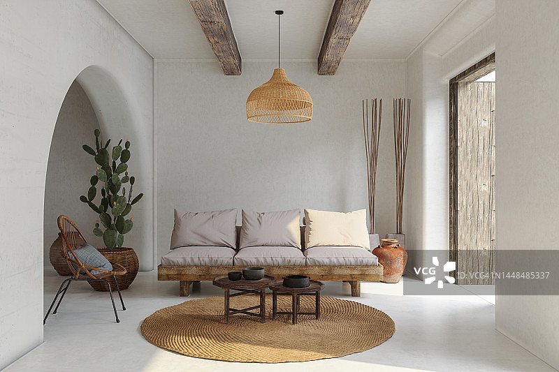 客厅内景：沙发、藤椅、仙人掌和咖啡桌图片素材