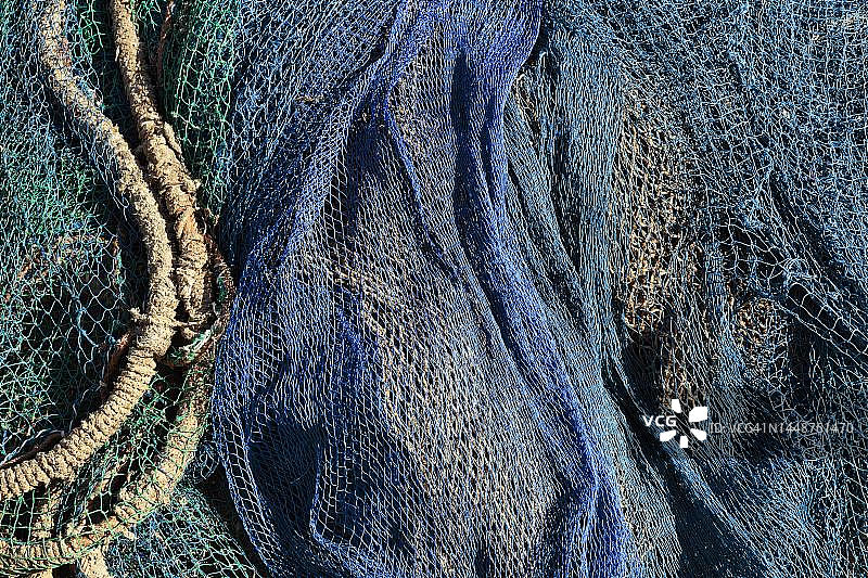 摩洛哥港口中的蓝绿色渔网图片素材