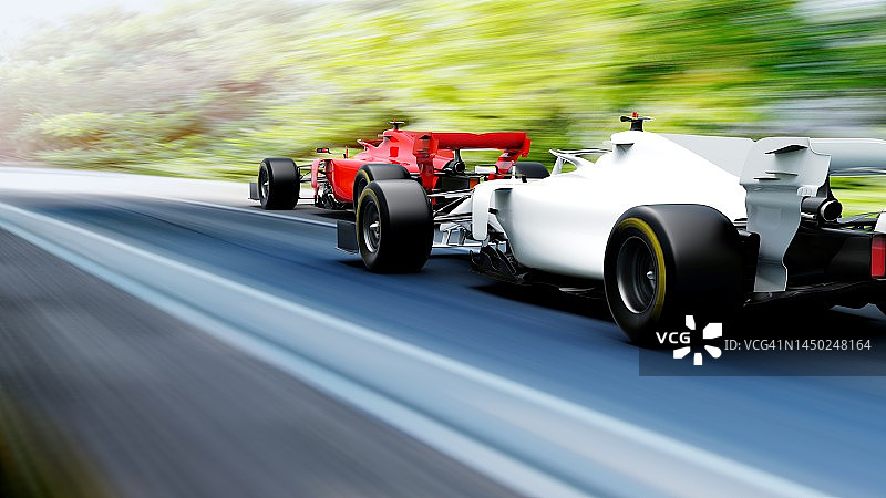 在赛道上领先的红色赛车图片素材