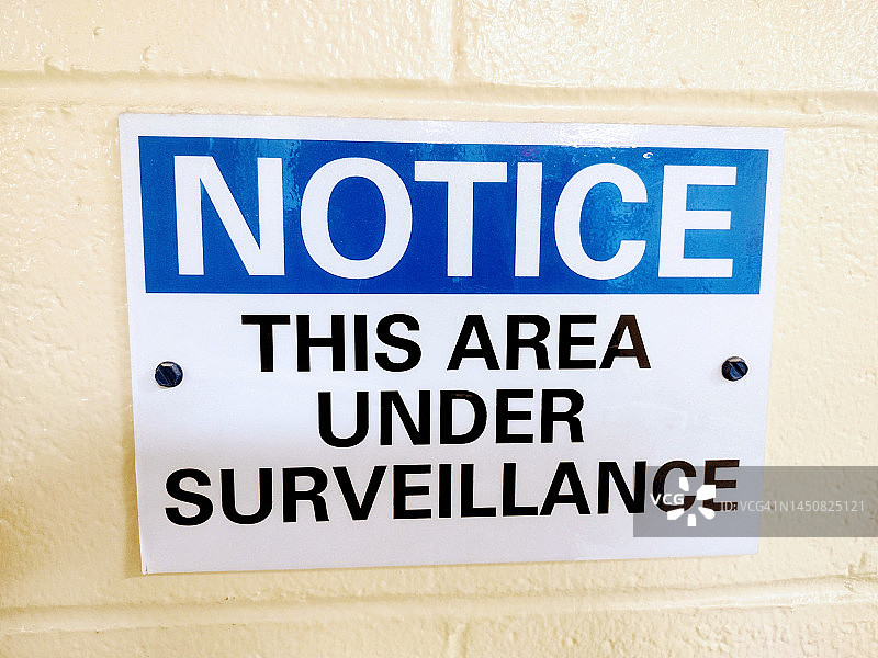 墙上的“正在监控区域”提示牌图片素材
