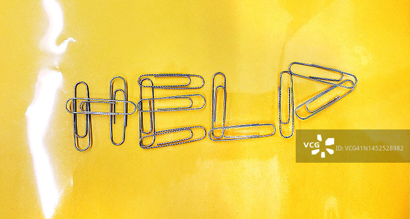 使用回形针寻求帮助图片素材