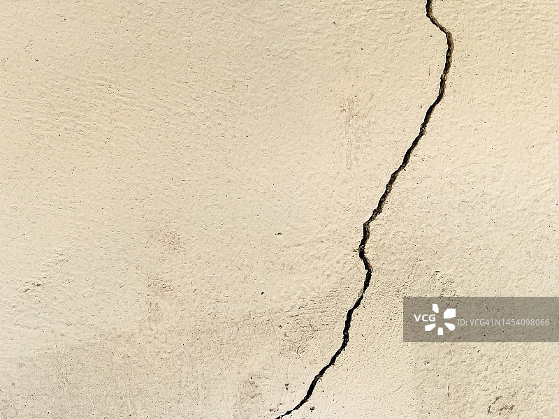 开裂的黄色墙壁图片素材