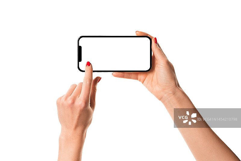 女人手拿白色背景上的现代无框智能手机模型图片素材