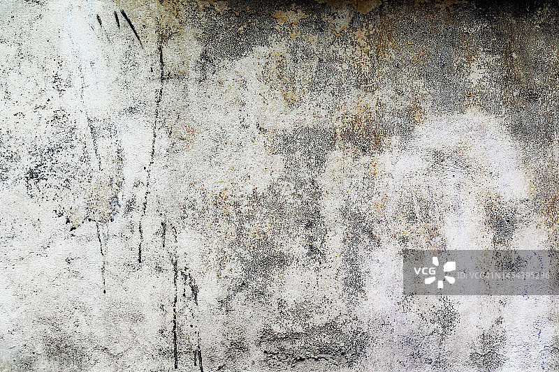 布鲁塞尔脏污水泥墙上的白色旧漆图片素材
