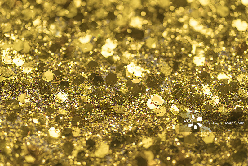 闪闪发光的金粉背景和纹理的宏观图像俯视图图片素材