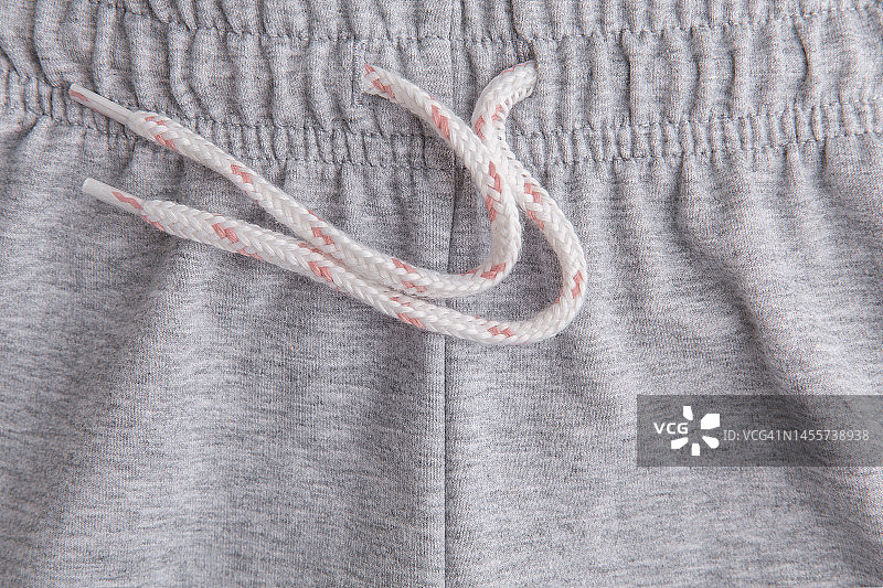 运动裤睡裤松紧腰带和抽绳图片素材