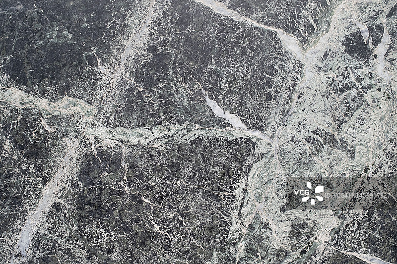 带有白色外壳的结构化黑色大理石纹理图片素材