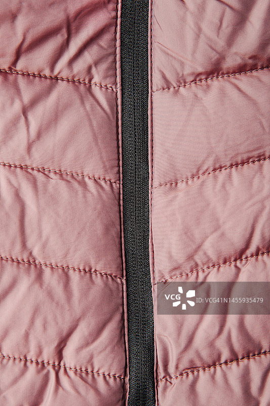 羽绒服纹理：冬季都市服装的绗缝背景图片素材