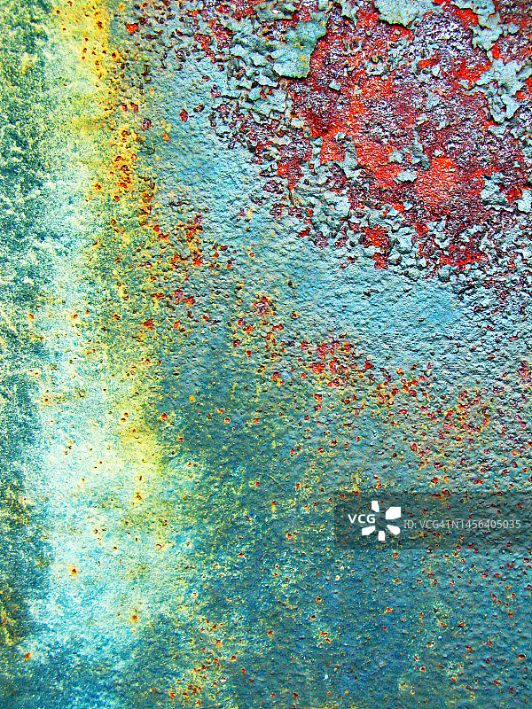 巴黎生锈金属板上的风化蓝色和绿色油漆图片素材