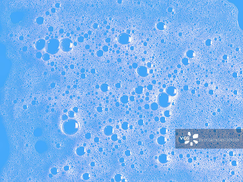 蓝色背景浴室中的气泡和肥皂泡图片素材