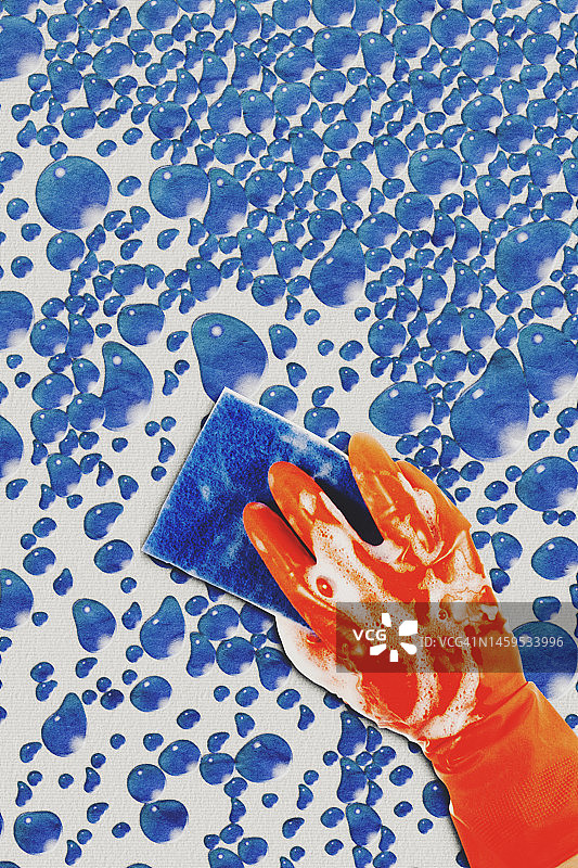 手持抹布擦拭窗户图片素材