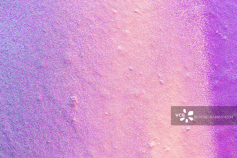 喷绘粉色和紫色墙壁的微距特写图片素材