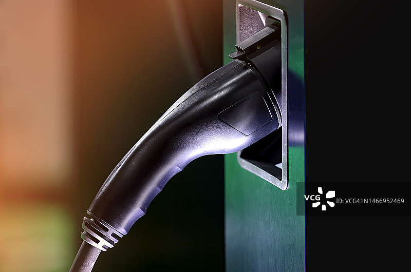 电动汽车充电站减少汽油消耗图片素材