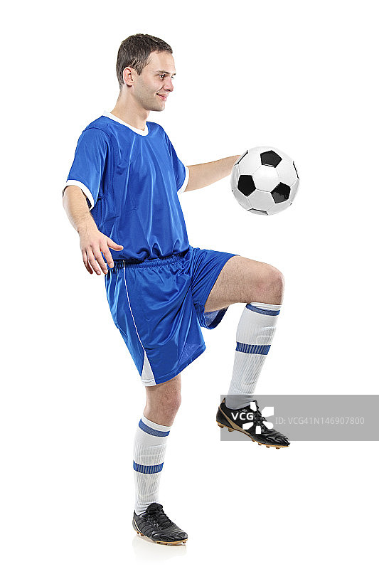 足球运动员带球图片素材