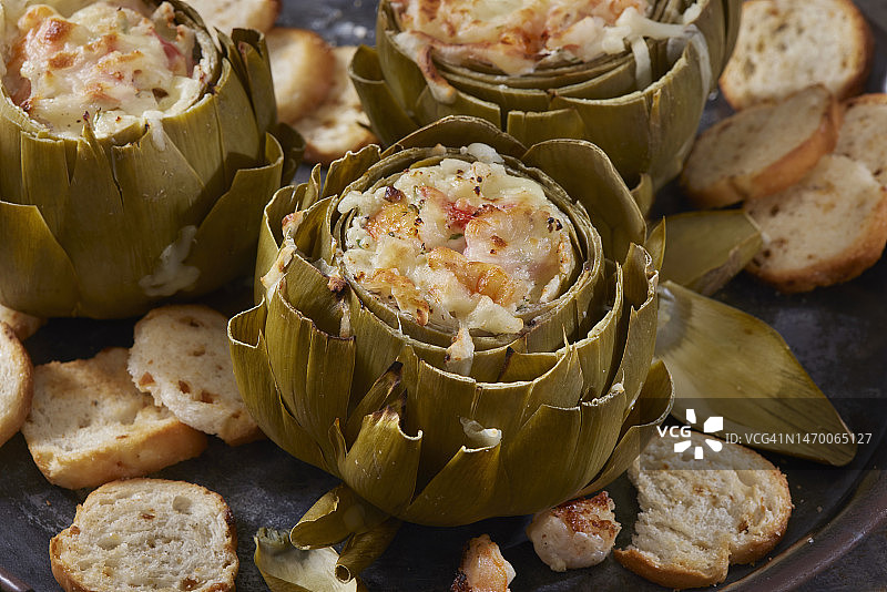 焗蟹肉鲜虾酿朝鲜蓟图片素材