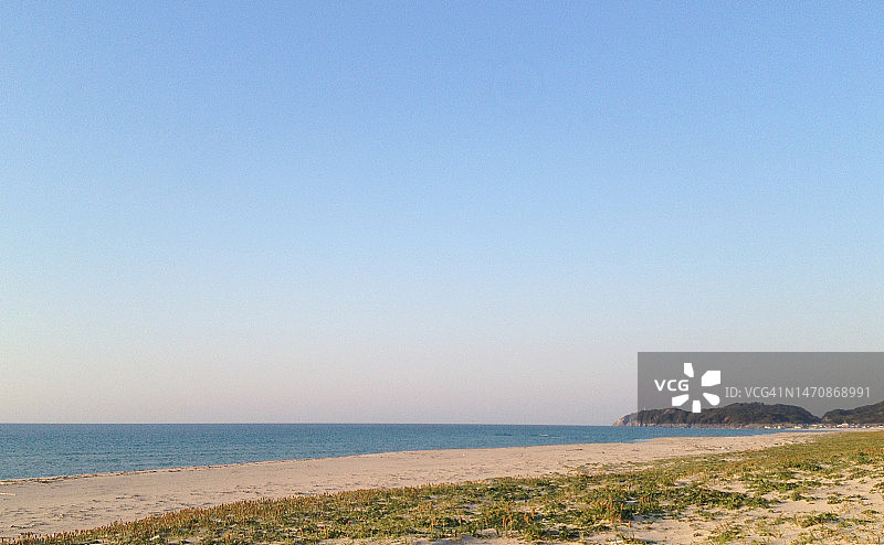 平静的日落海滩图片素材