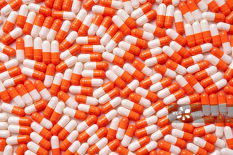 橙色胶囊背景图片素材