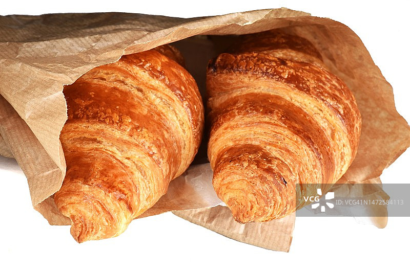 法国白色背景下的羊角面包特写图片素材