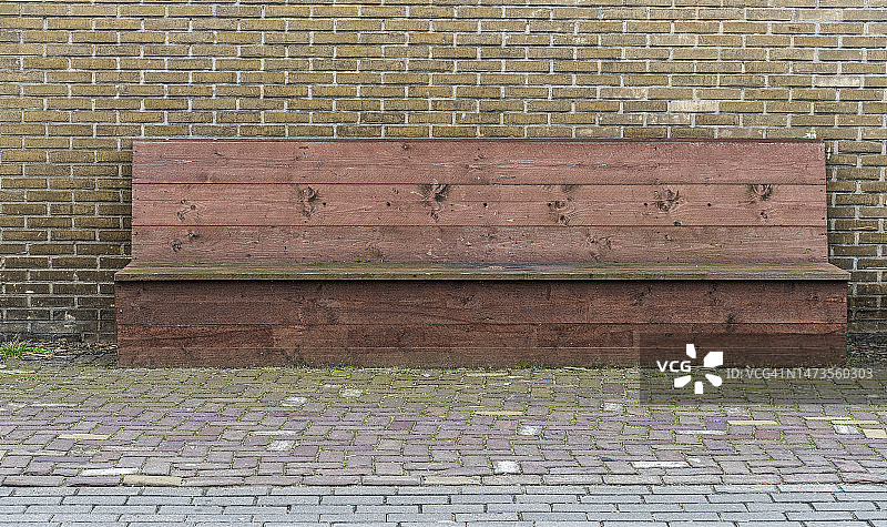 细长的红色木制长凳图片素材