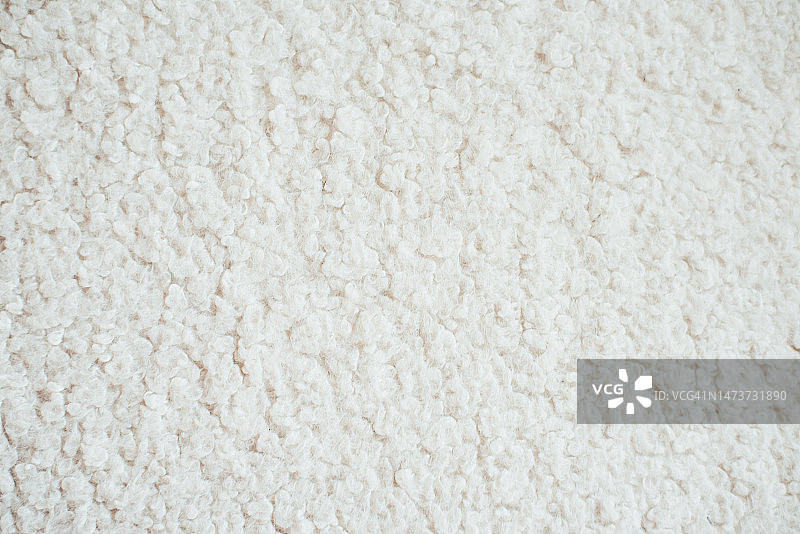 带有羊皮毛的面料浅色背景图片素材