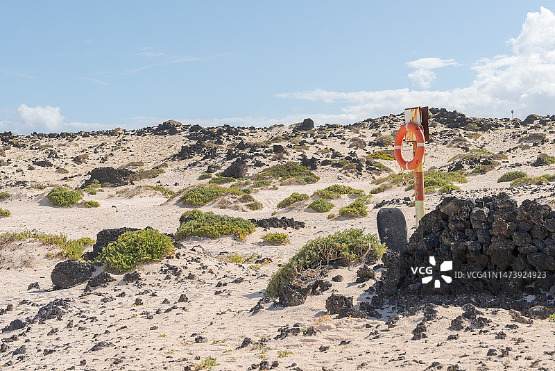 Caleton Blanco海滩上的杆子上的救生圈图片素材