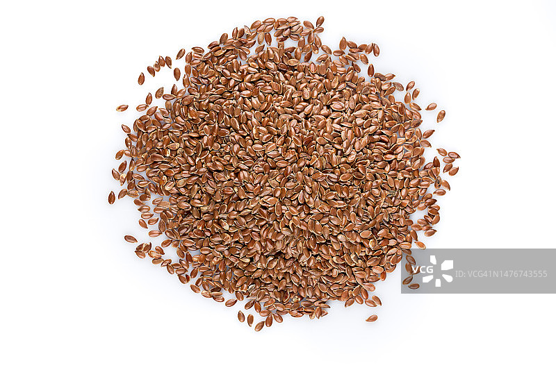 白色背景下的亚麻籽图片素材