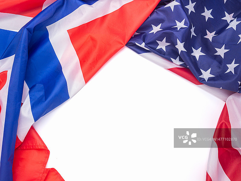 白色背景上的挪威和美国国旗一角图片素材