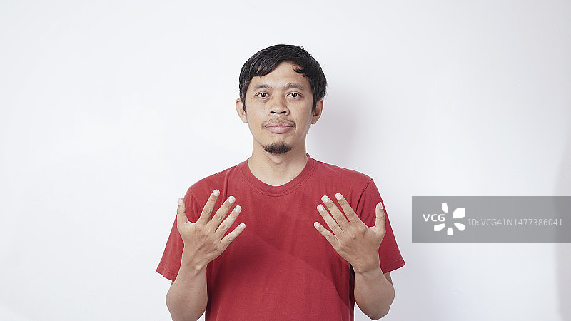 年轻男士用手势表达图片素材
