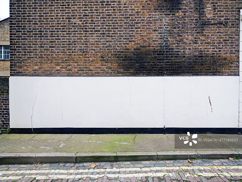 伦敦风化的砖和混凝土墙图片素材