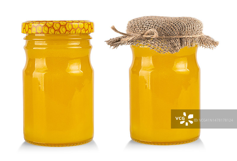 白色背景上的蜂蜜罐图片素材