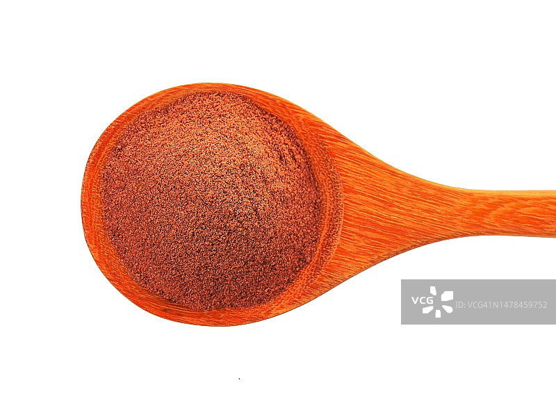 白色背景木勺中的麦芽提取物图片素材