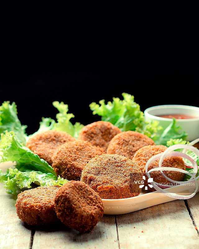 黑色背景餐桌美食特写，印度曼尼普尔邦英帕尔图片素材