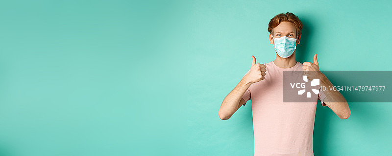 新冠疫情，疫情与生活方式概念，快乐的红发男子图片素材