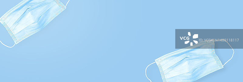 蓝色背景上的一次性口罩，罗马尼亚图片素材