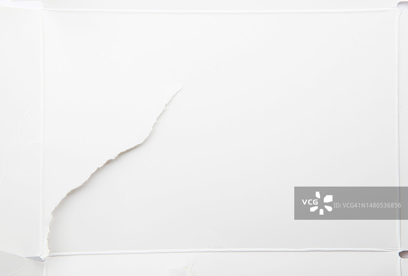 白色撕裂纸板表面纹理图片素材