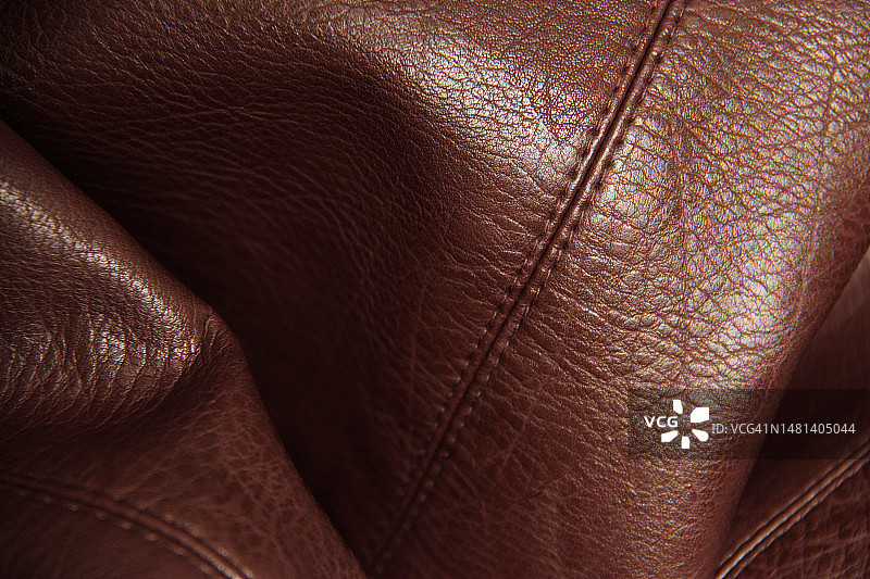 罗马尼亚樱桃皮革褶皱背景的颜色图片素材