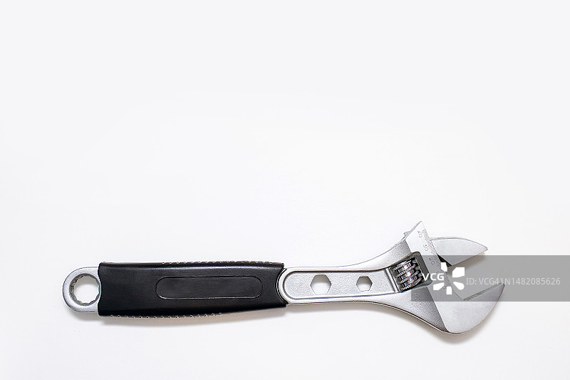 白色背景上的现代活动扳手，有文字的自由空间图片素材
