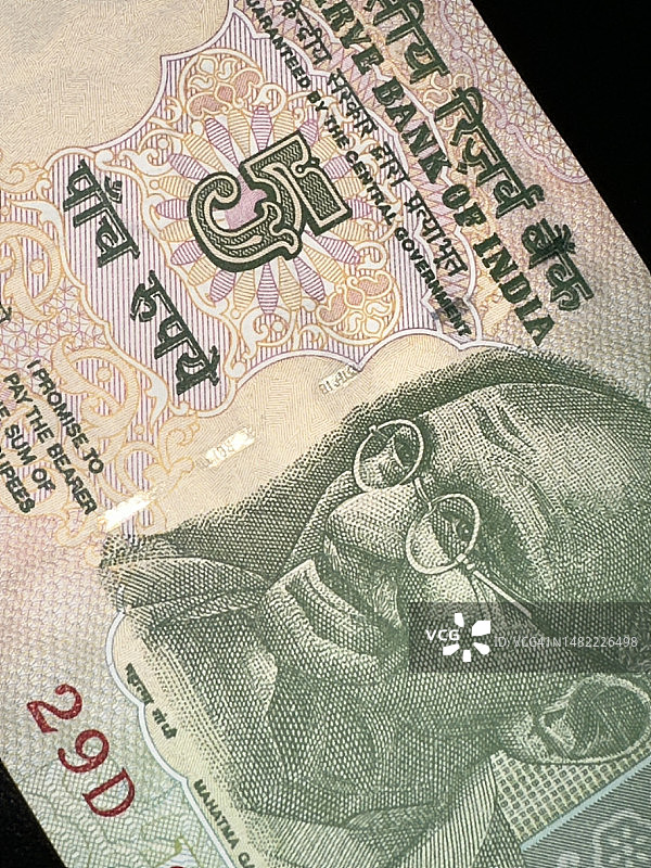 印度纸币上的圣雄甘地肖像图片素材