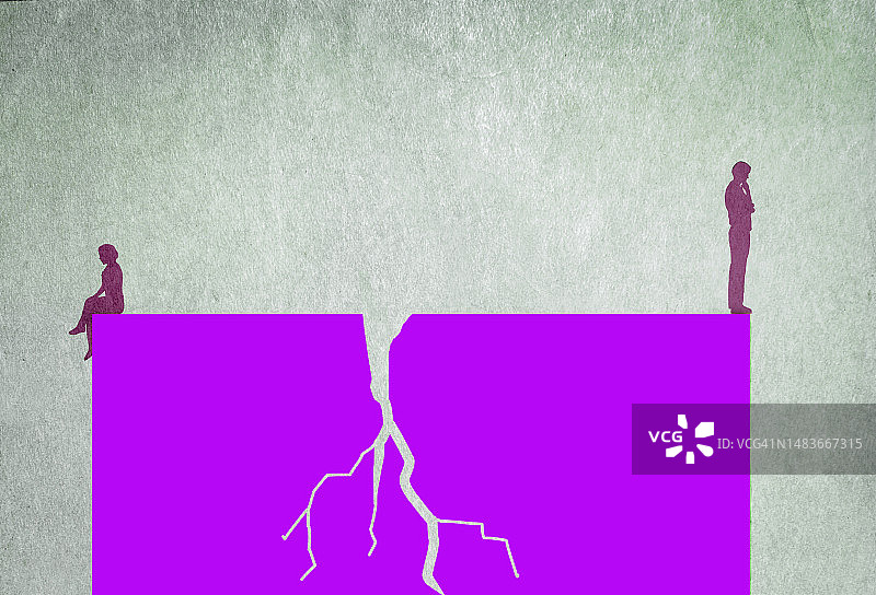 情侣站在破裂石块的两端图片素材