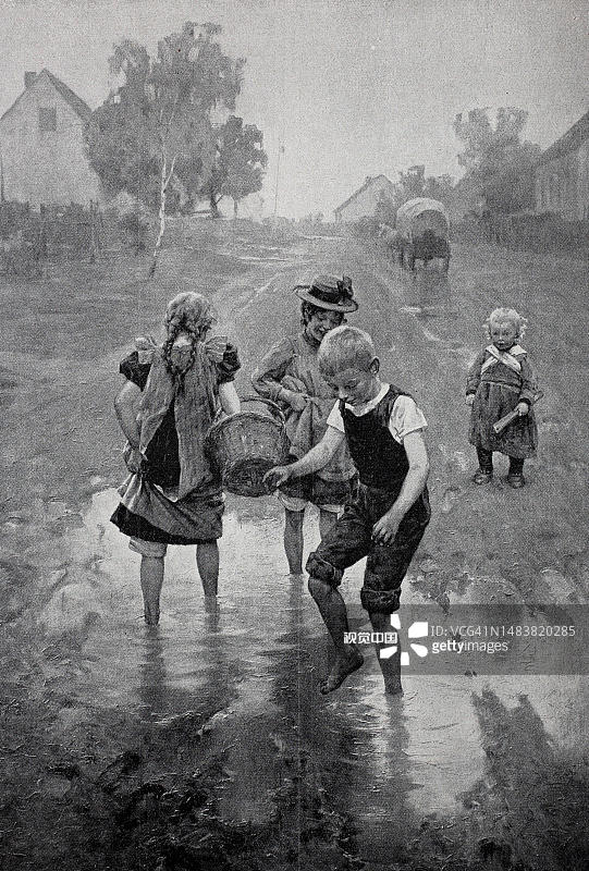 德国乡村街景：1898年儿童在水坑中玩耍图片素材
