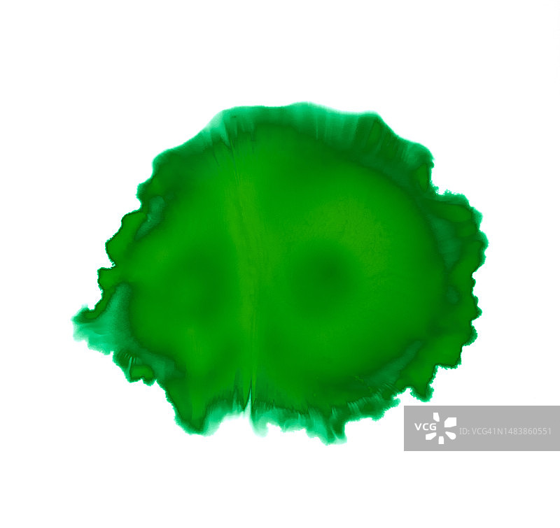 滴落在白色背景上的绿色油漆图片素材