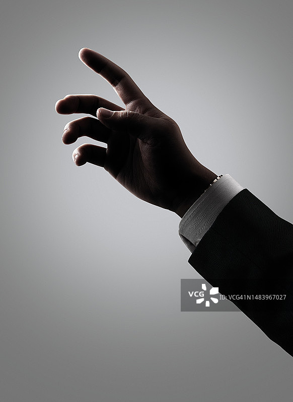 手、男人的手、握住、姿势、手势、西装、西装、逆光、路径图片素材