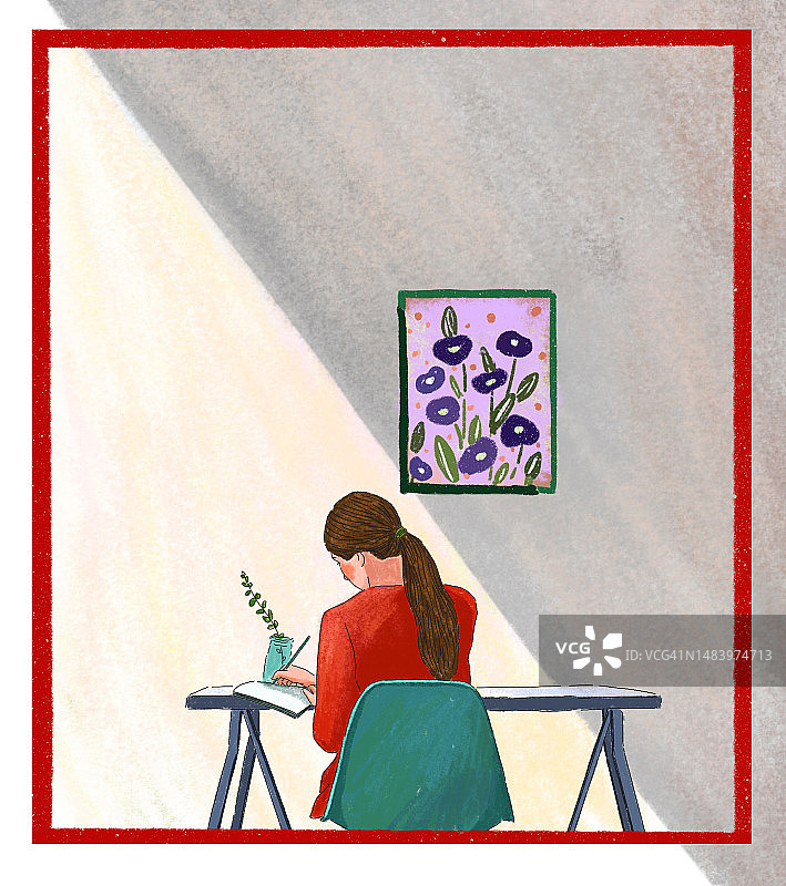 休闲独处：伏案工作的女子背影图片素材